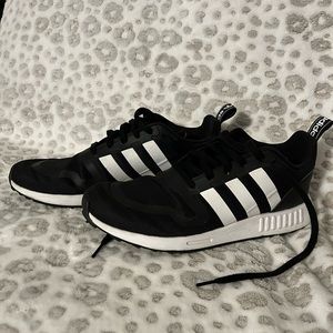 Men’s black and white Adidas